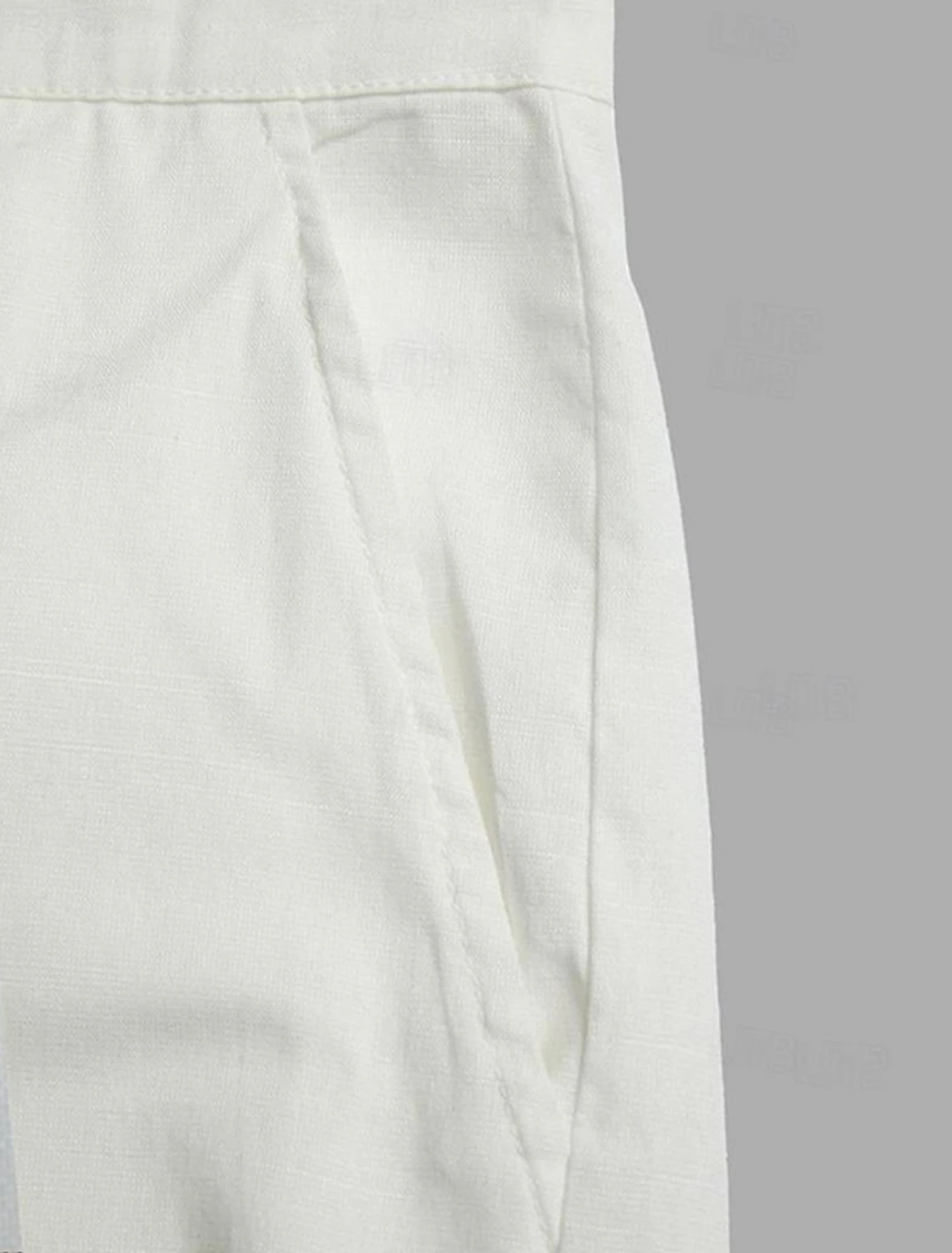 Close-up of white linen pocket seam – breathable material for casual daily wear