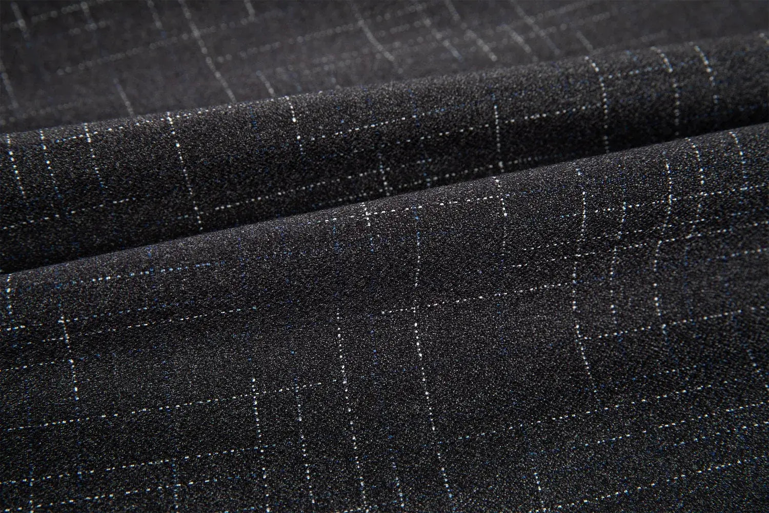 Detailed texture of black plaid suit fabric – close-up weave