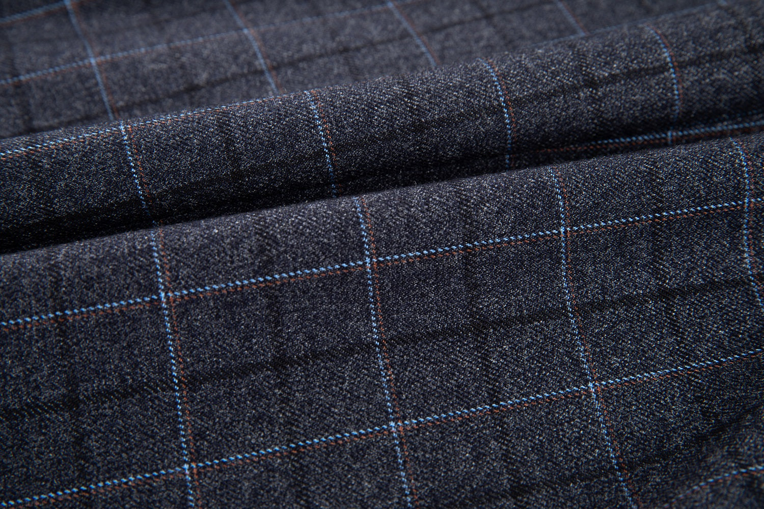 Close-up of grey check fabric texture – fine plaid weave for elegant men’s party vest