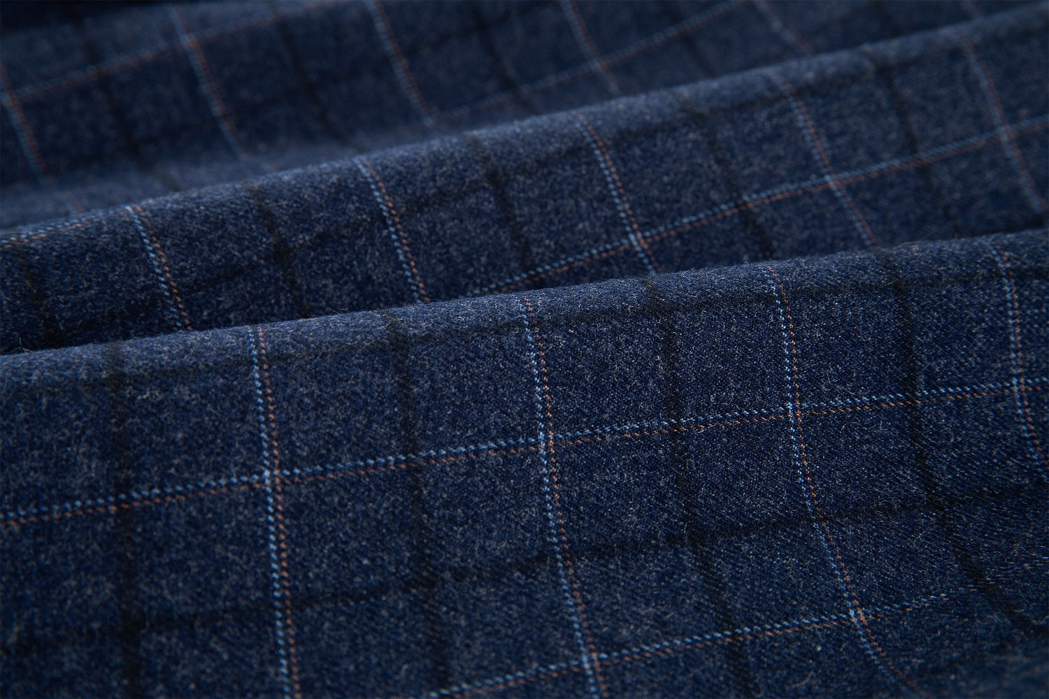 Large navy plaid pattern on wool-blend fabric – textured surface of stylish men’s party and wedding vest