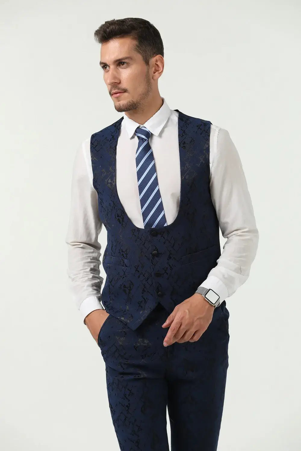 Close-up of navy patterned vest and trousers – sleek men’s prom outfit with non-floral design