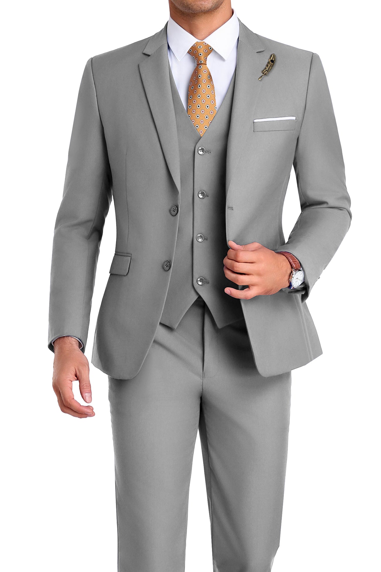 Close-up of grey slim fit suit jacket with pocket square and lapel pin detail