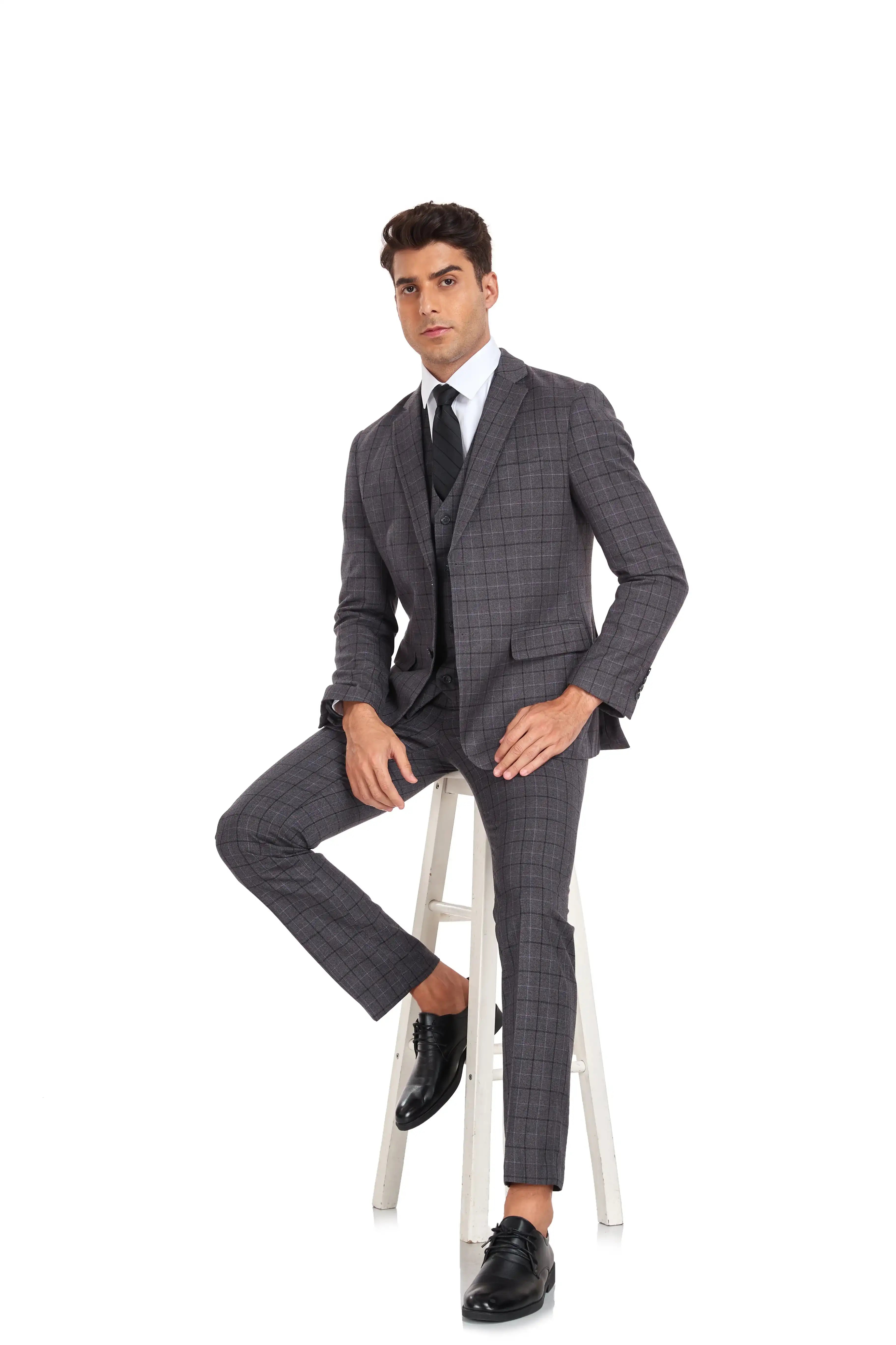 Gray checkered suit for men – slim fit design seated pose