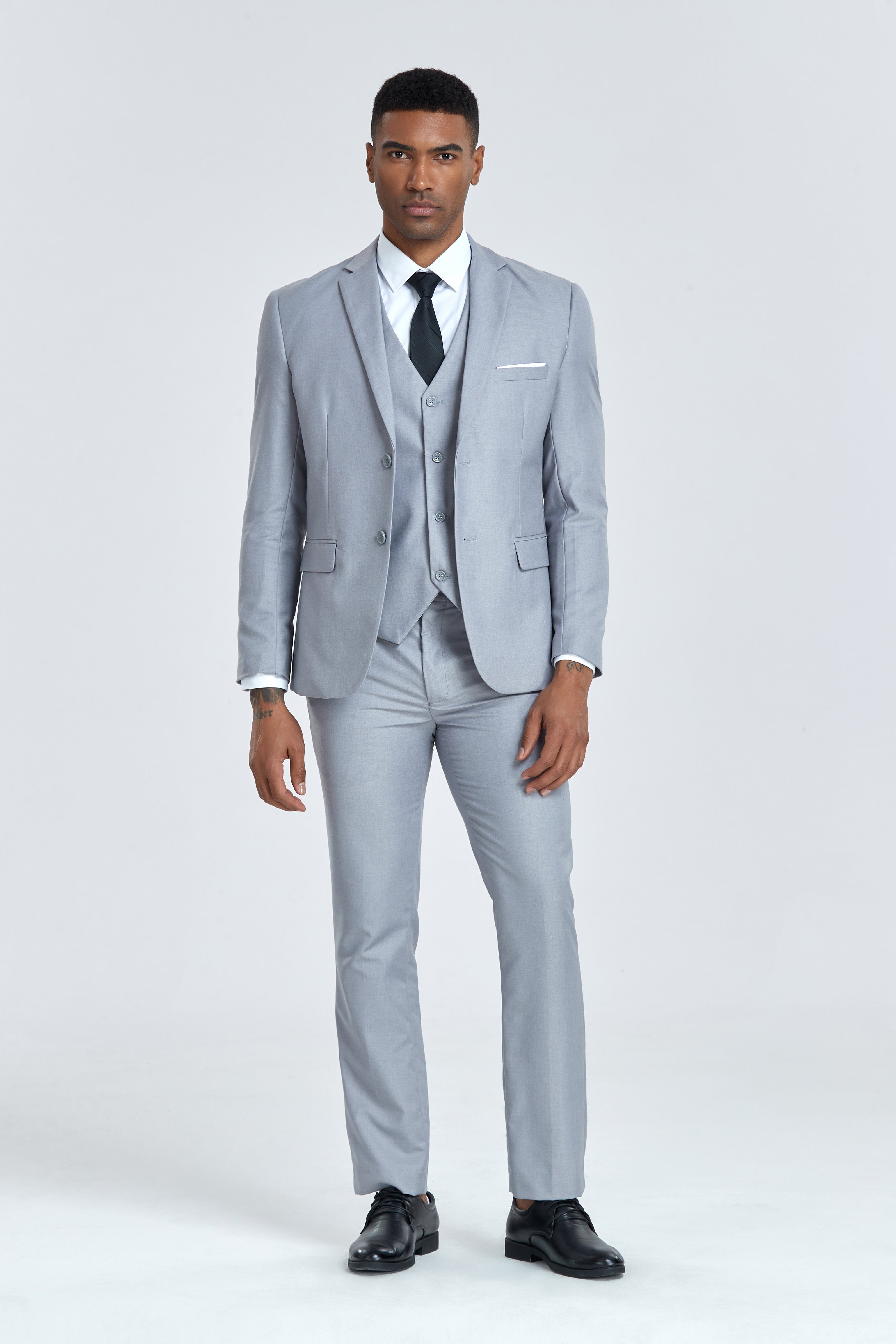 Grey business 3 piece suit for men styled with tie and white shirt, formal wedding look
