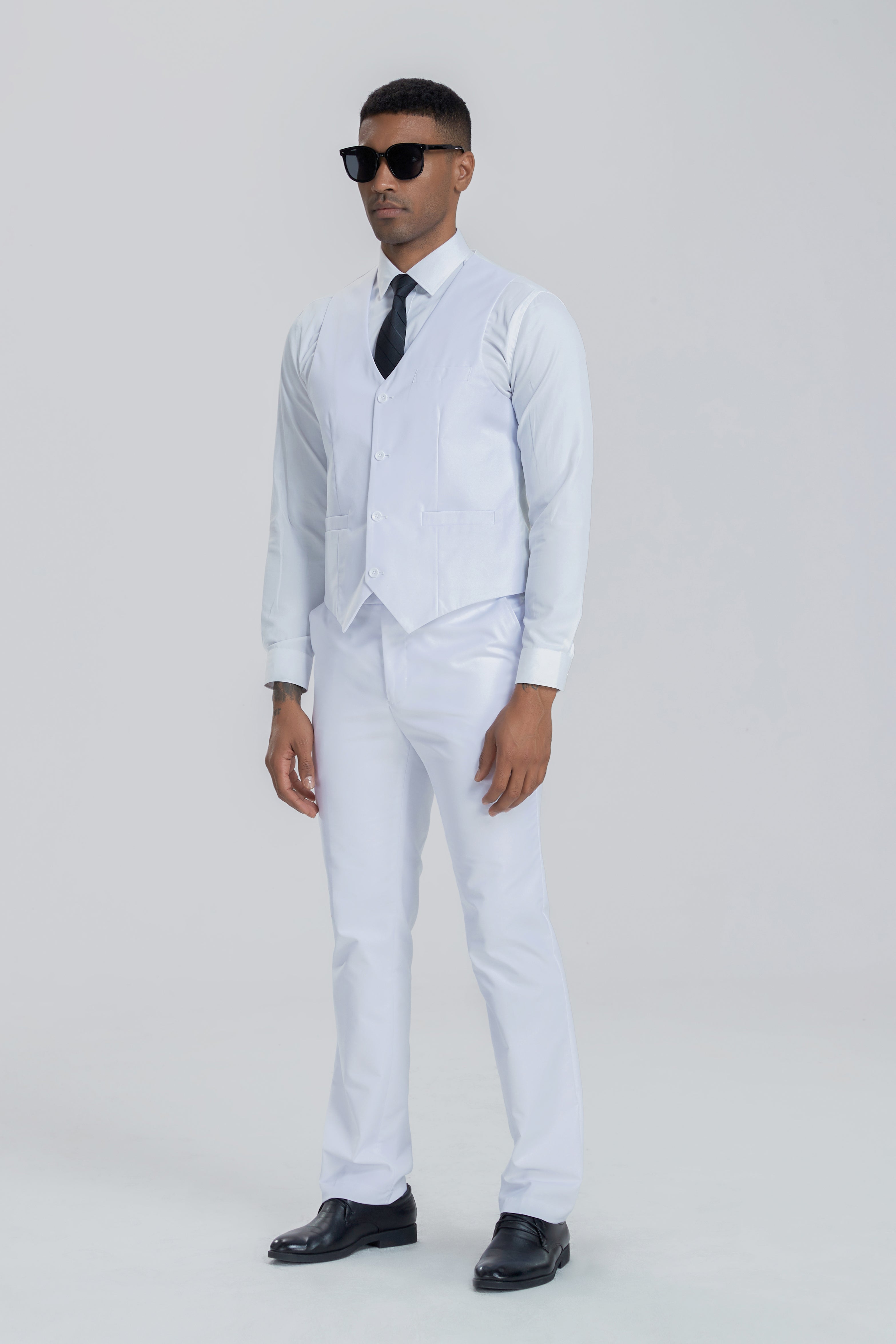 White three-piece formal suit with vest and tie – sunglasses styling option