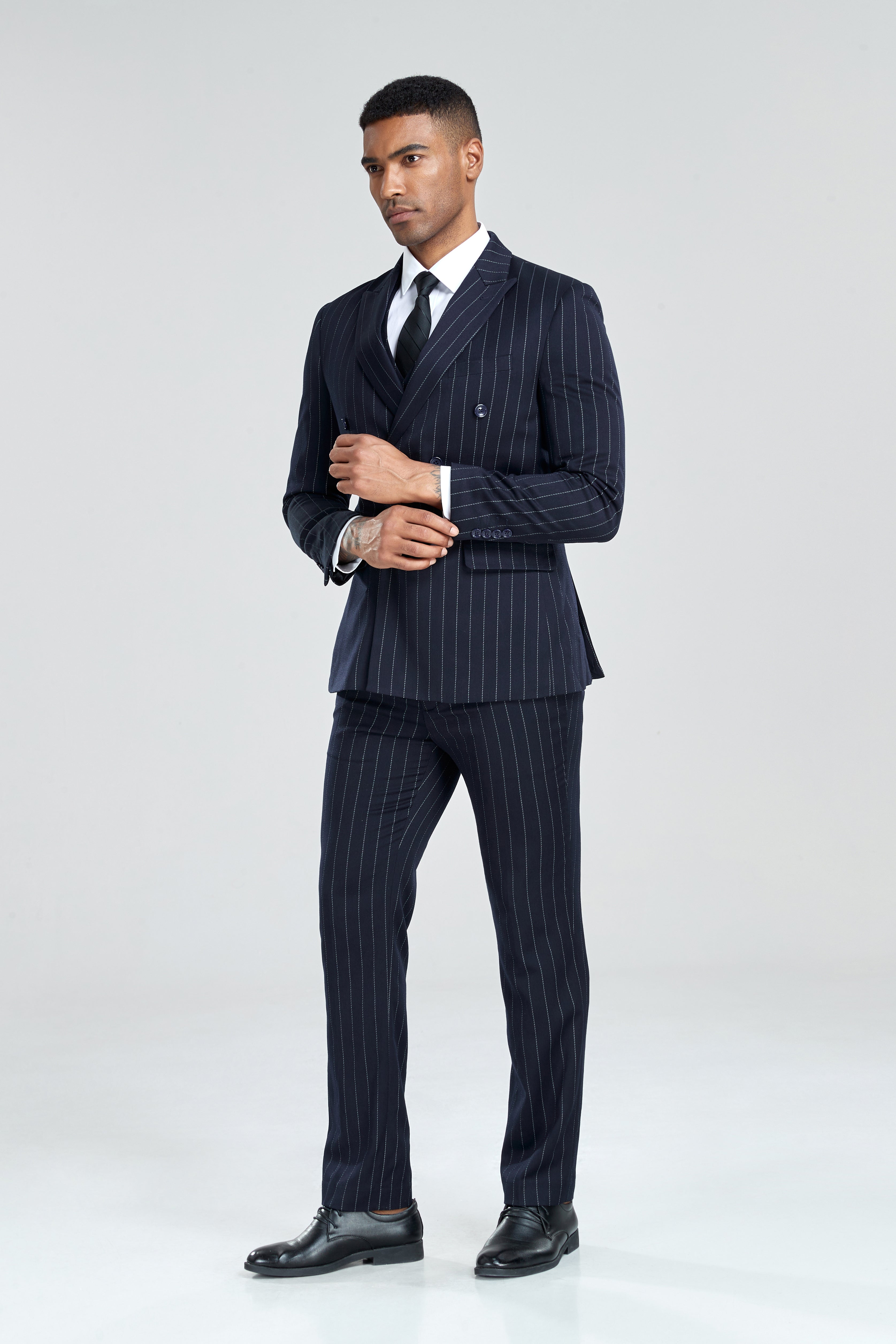 Retro-inspired navy wide pinstripe suit with blazer, waistcoat, and trousers set