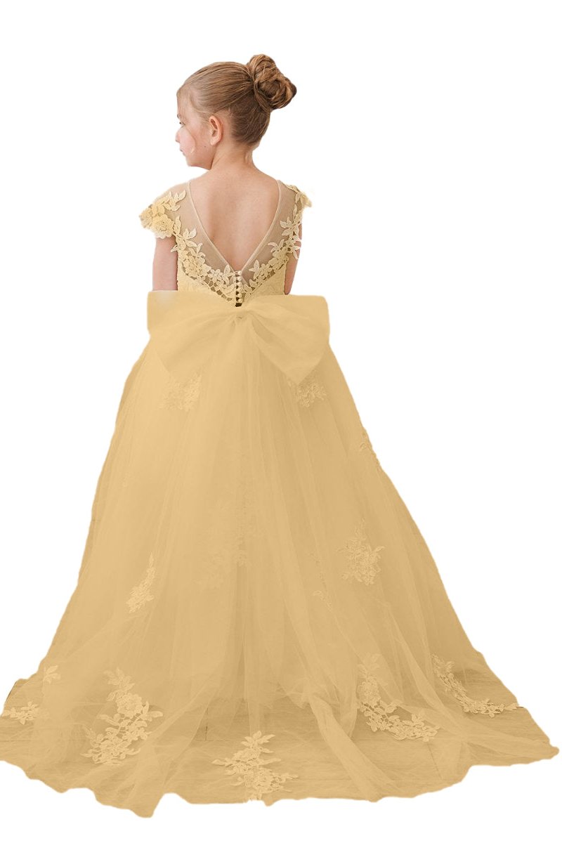 Wehilion flower girl tulle dress in soft yellow with lace details and a flowing skirt