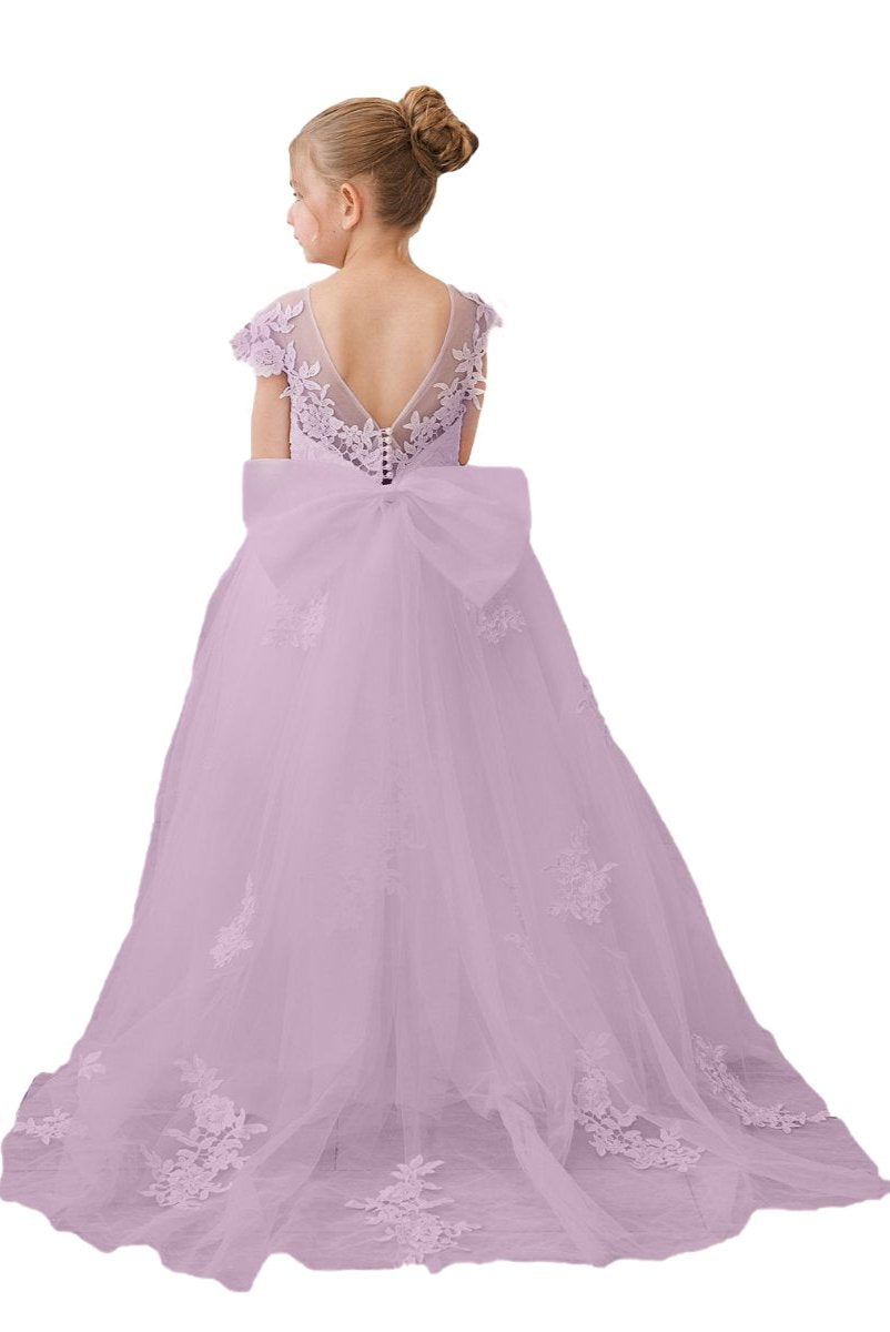 Wehilion flower girl tulle dress in lavender with a lace design and a large bow on the back