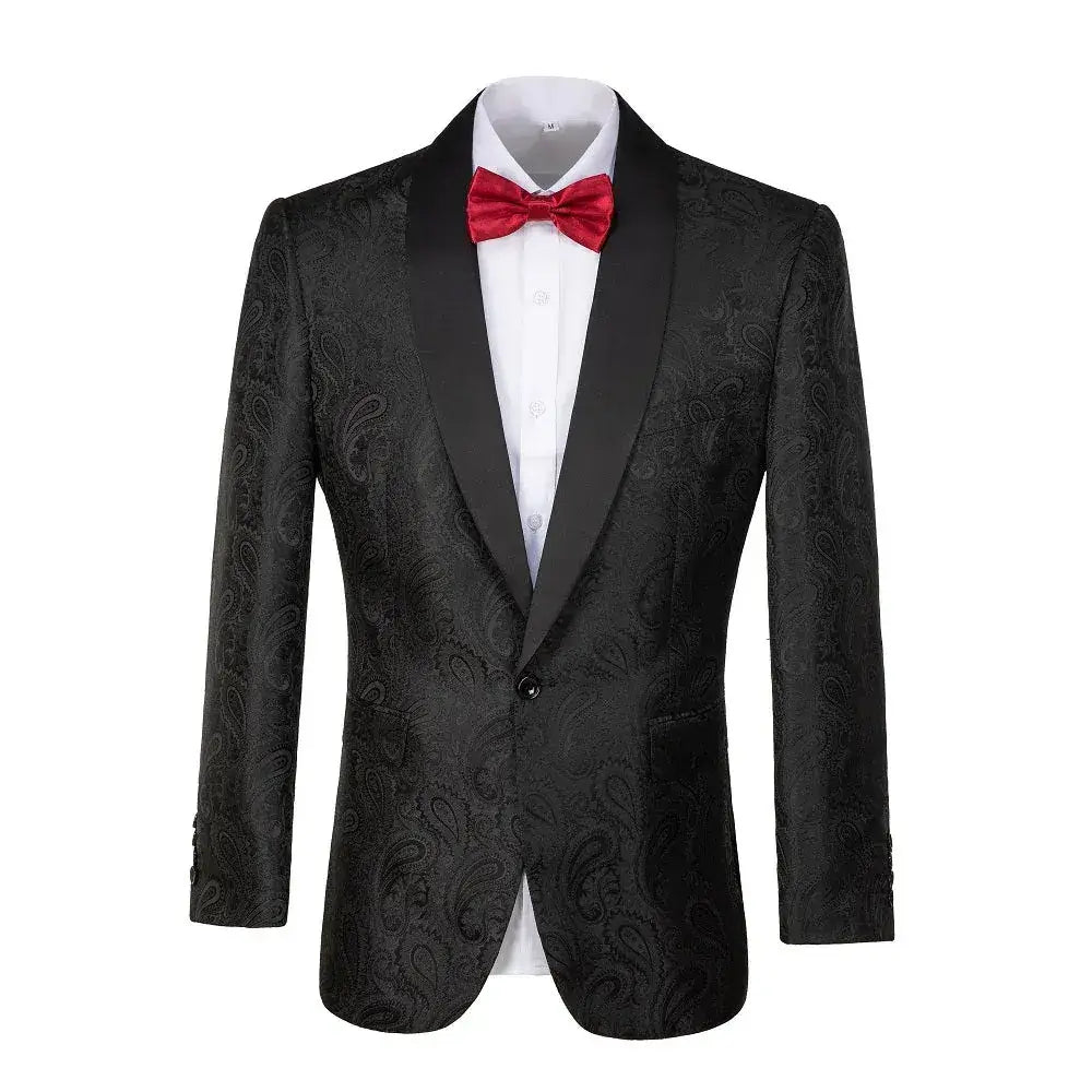 Close-up front view of a black paisley patterned blazer with black satin peak lapels and a red bowtie.