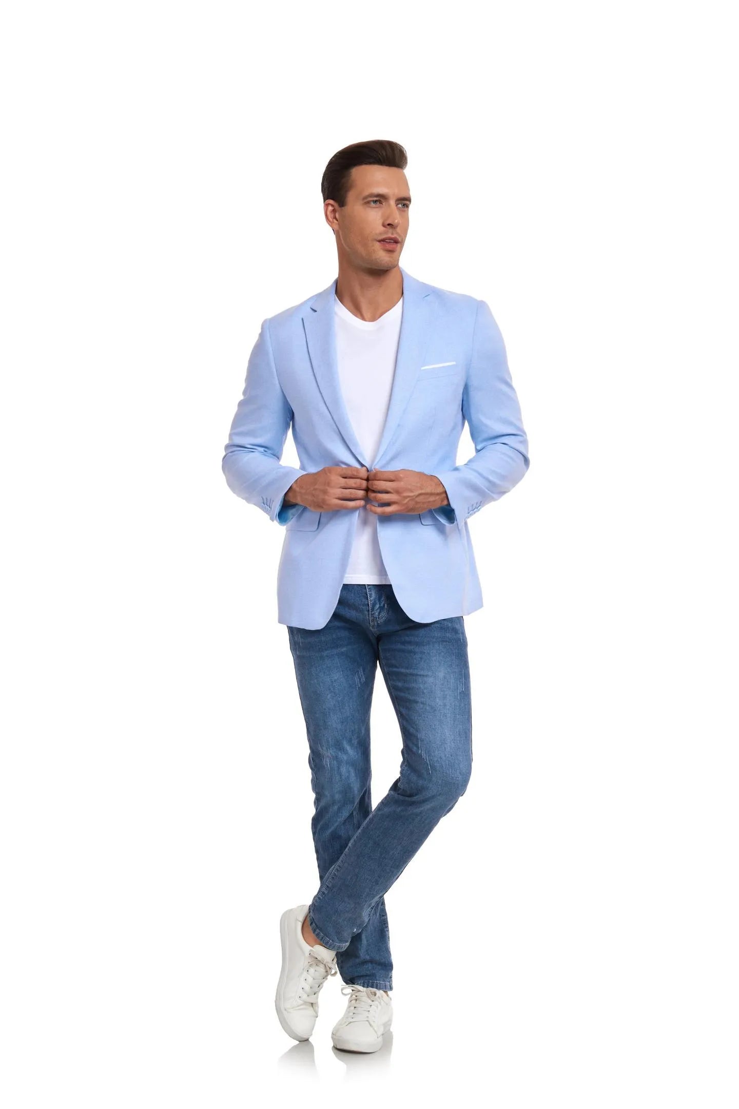 full body view of model in a blue two-button blazer and blue jeans, exuding sophistication for casual settings.