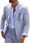 Load image into Gallery viewer, Close-up view of men's blue-and-white striped seersucker blazer with a sleek design.