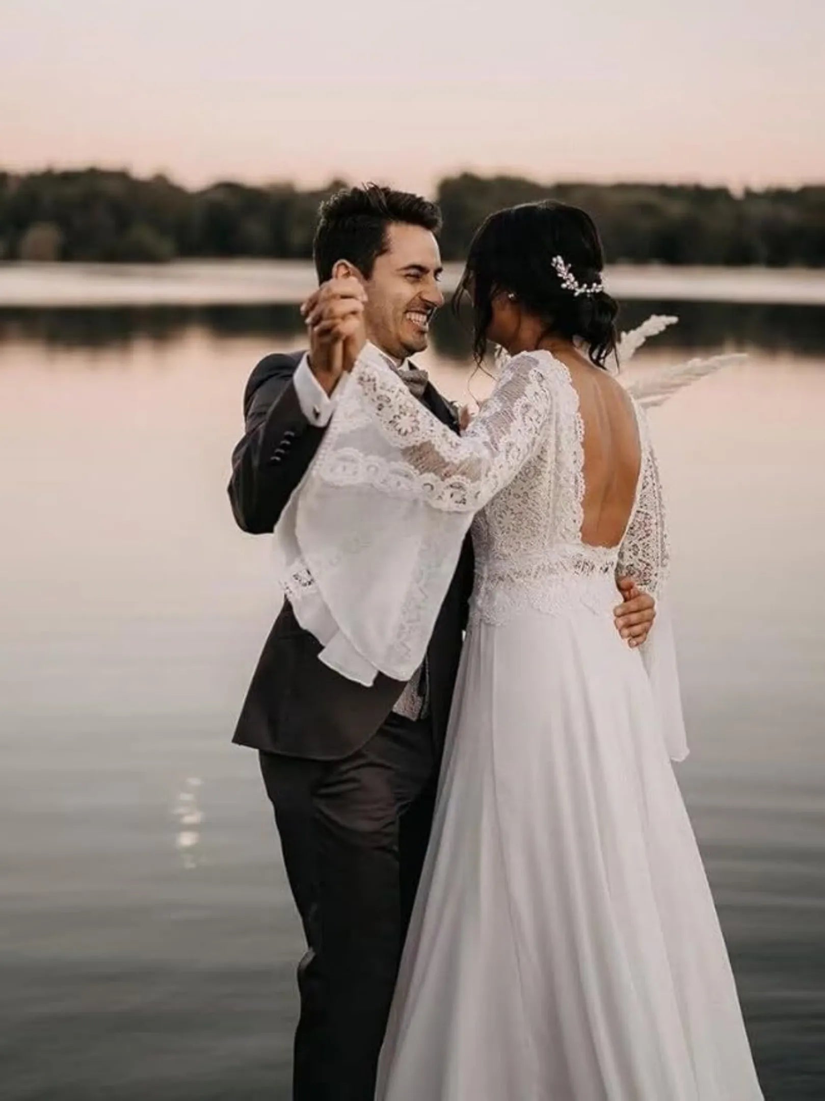 groom in 3 piece charcoal grey tuxedo with slim fit cut and classic vest design