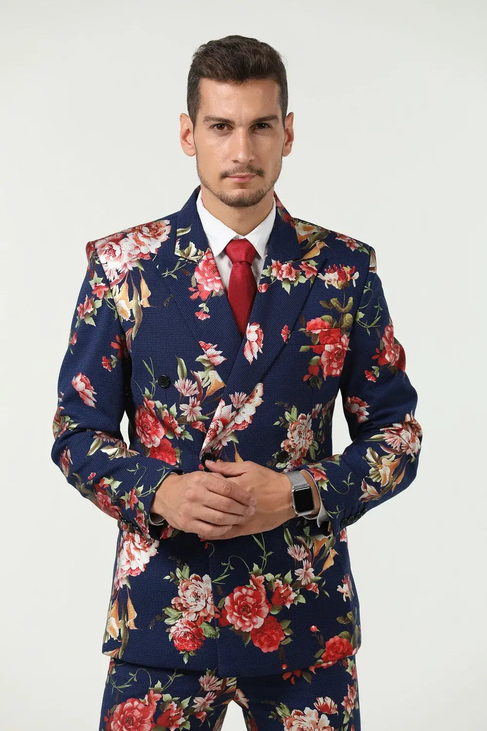 Sharp close-up of navy floral suit blazer – bold formal statement wear for men