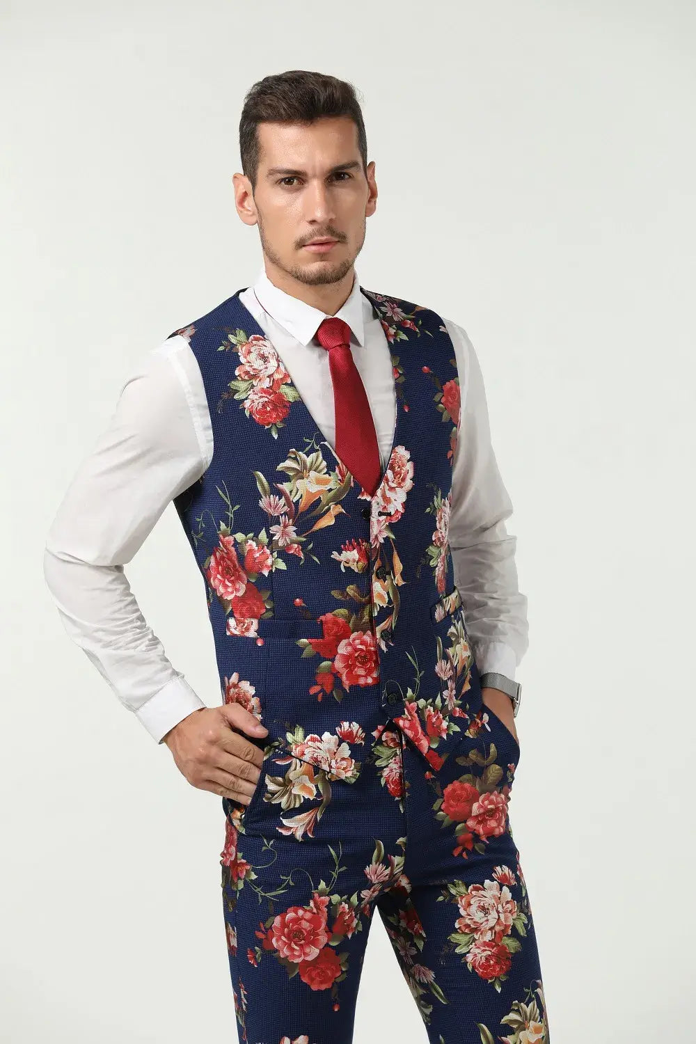 Close-up of men's navy floral suit vest and pants – unique patterned party style