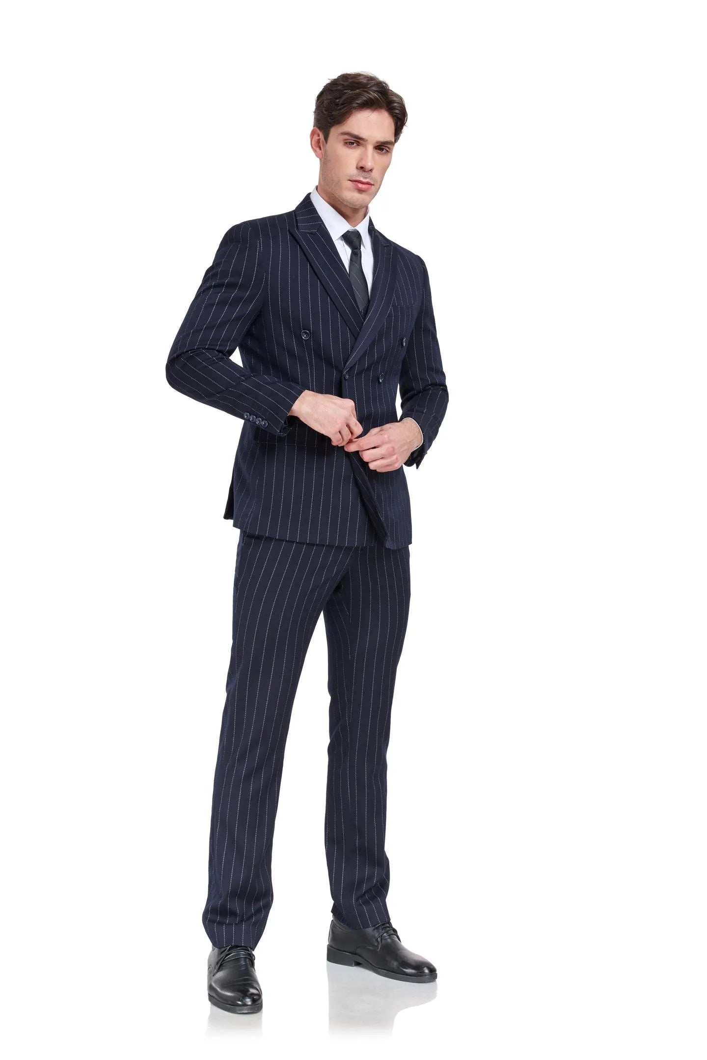 close-up of double breasted navy chalk stripe suit with retro stripe detailing and peak lapel
