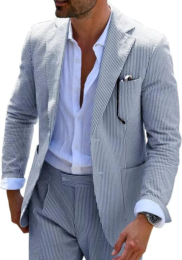 Navy blue-and-white striped seersucker blazer styled with a summer shirt for a smart casual look.
