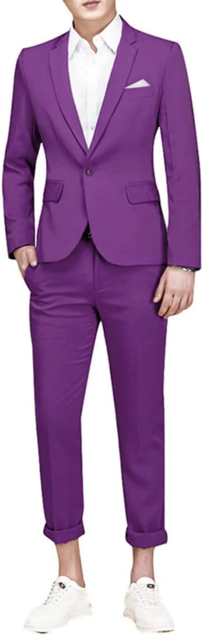 model wearing a purple single-breasted 2-piece suit with a white shirt, striped tie, and tailored pants, paired with white sneakers.