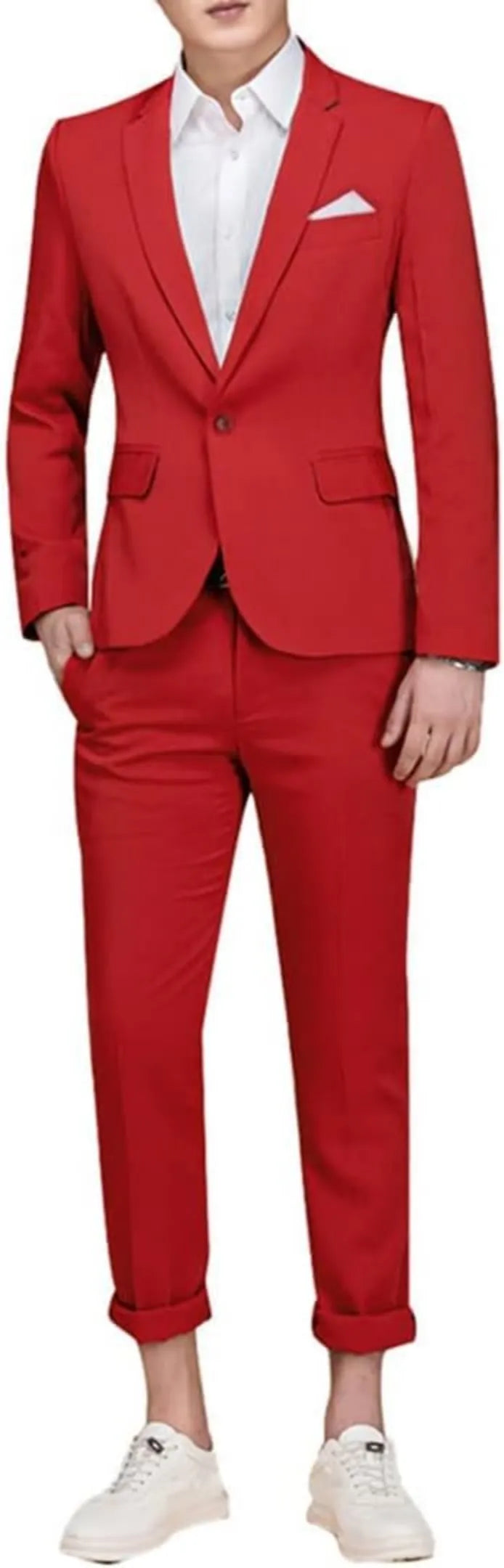 model wearing a red single-breasted one button suit, paired with a white shirt and sneakers.