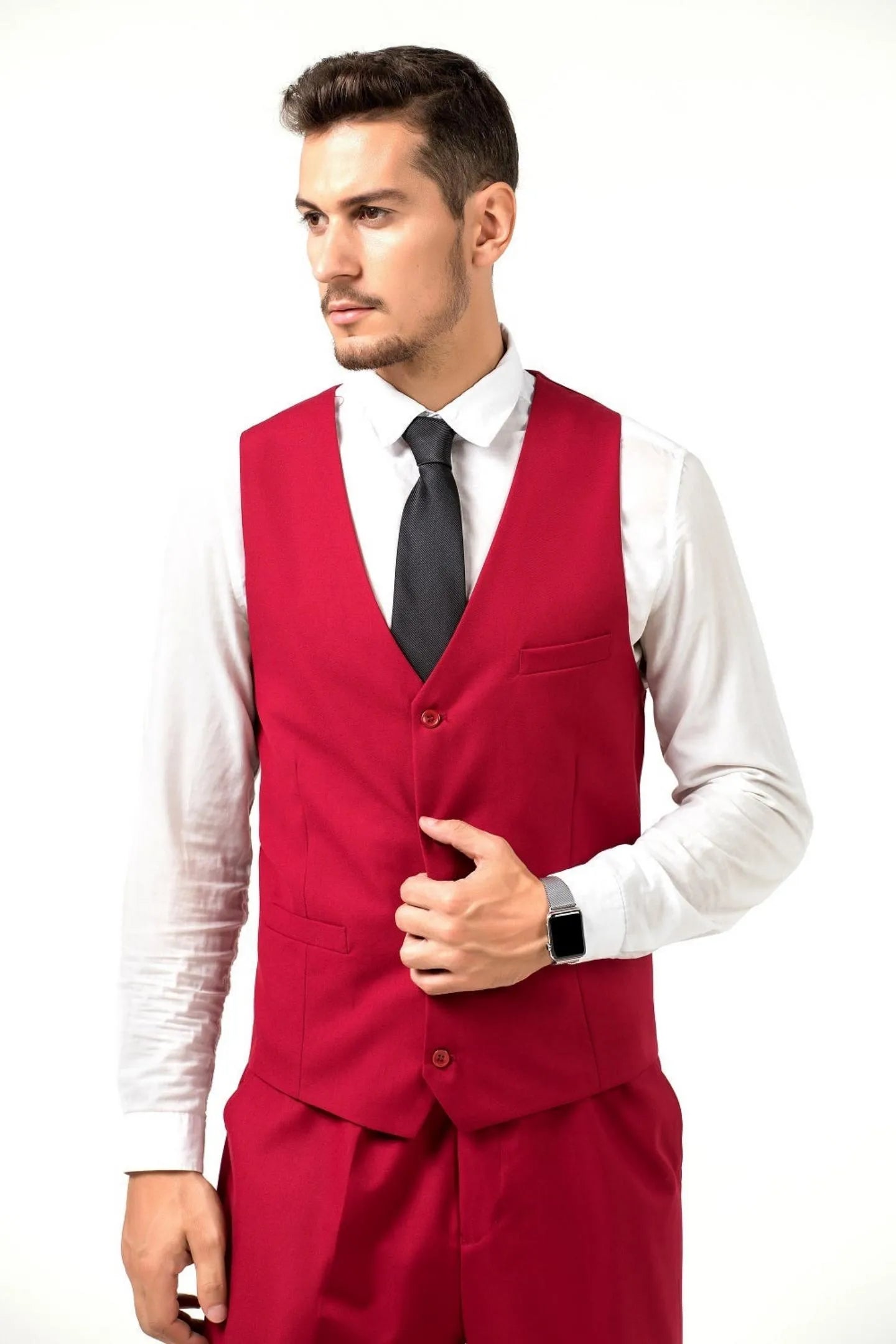 full body front view of a man wearing a red slim fit two-button suit with vest and black tie – sophisticated business attire.