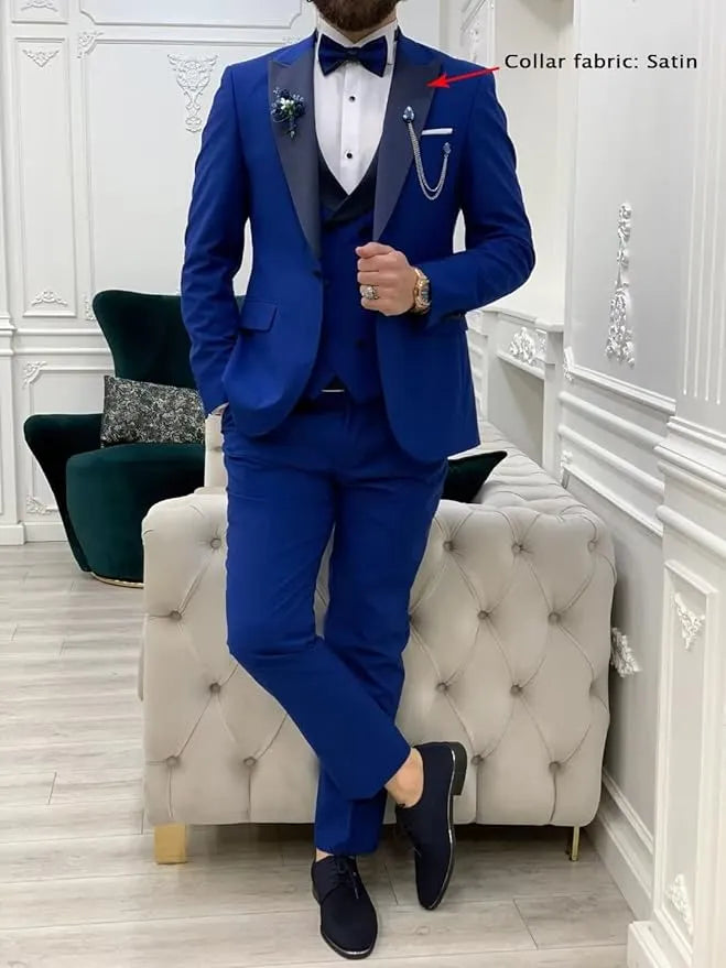 royal blue men's 3 piece suit styled for casual event with loafers