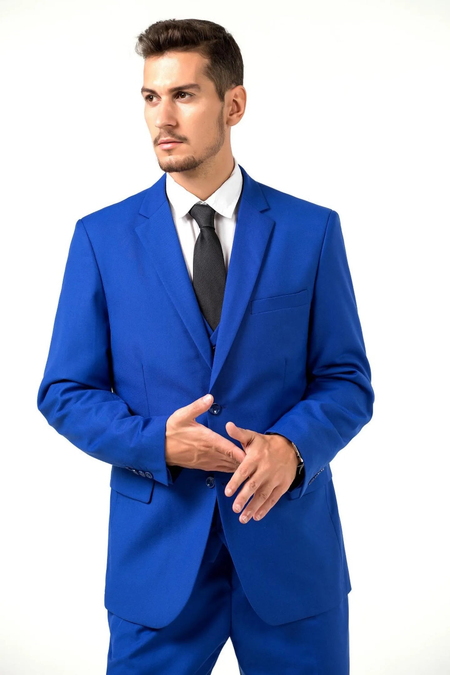 close-up front view of model wearing royal blue slim-fit two-button 3-piece suit, black tie, and white shirt.