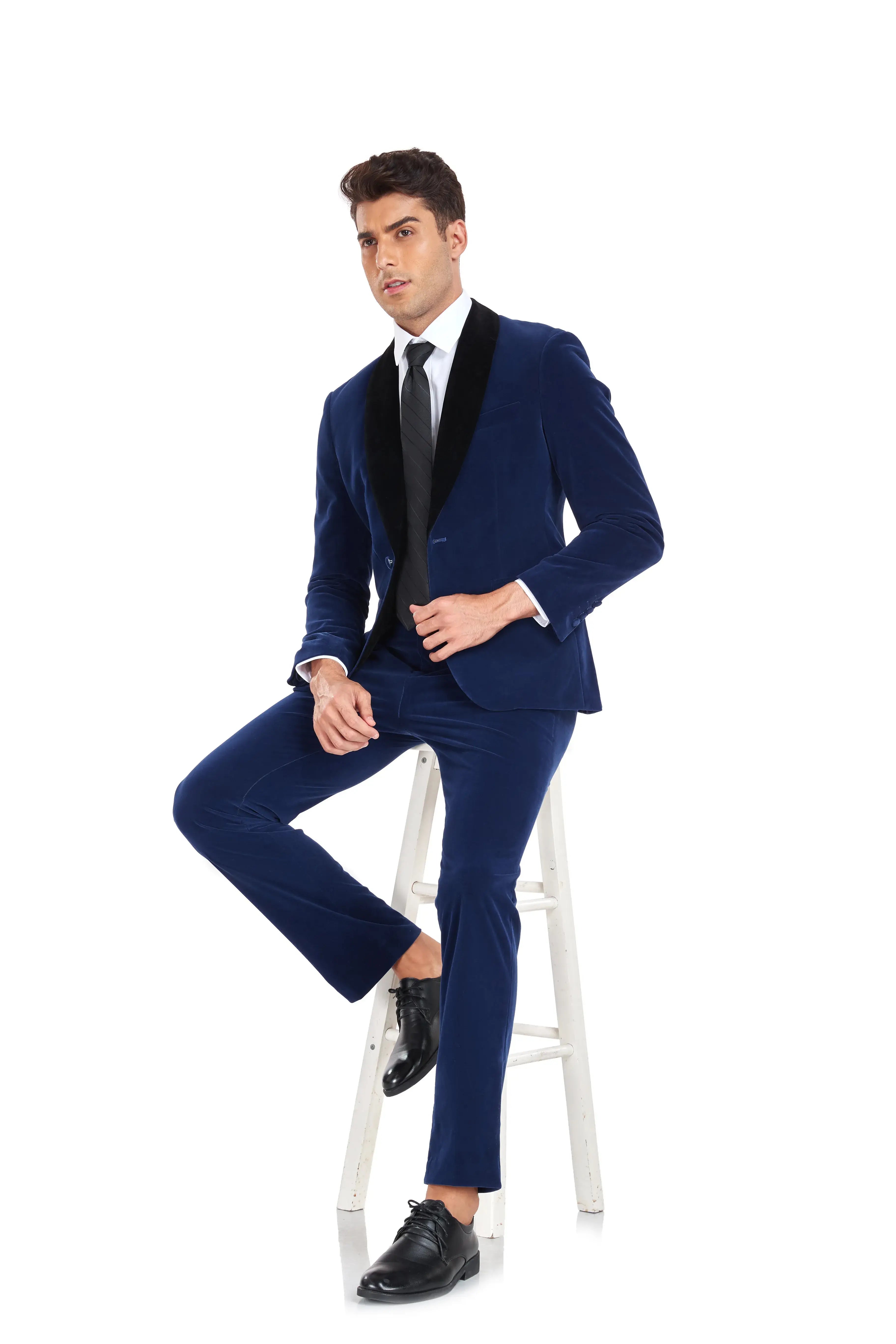 Seated man in royal blue velvet 2 piece suit with black shawl collar – elegant party and event outfit