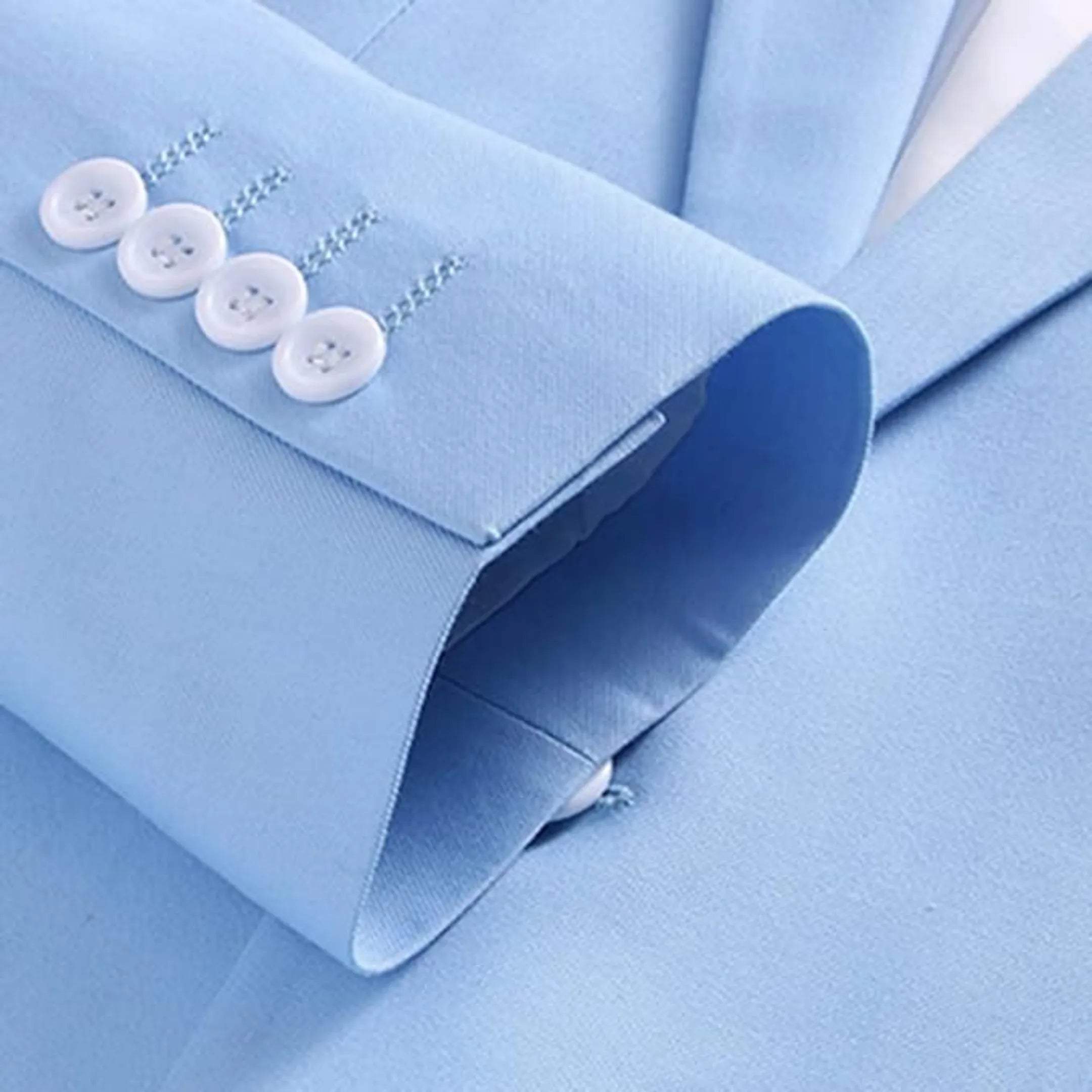 detailed close-up of sky blue blazer collar and fabric texture of men's formal jacket.