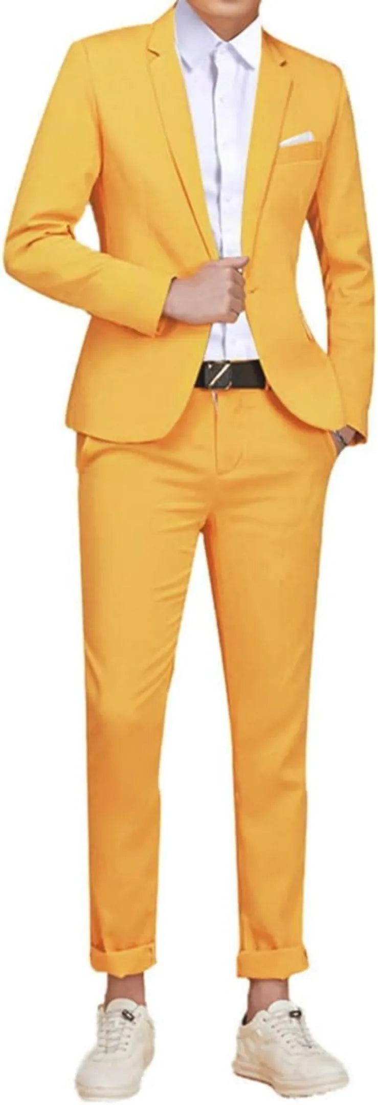 model in a yellow single-breasted 2-piece suit, with rolled-up trousers and white sneakers for a casual yet polished look.
