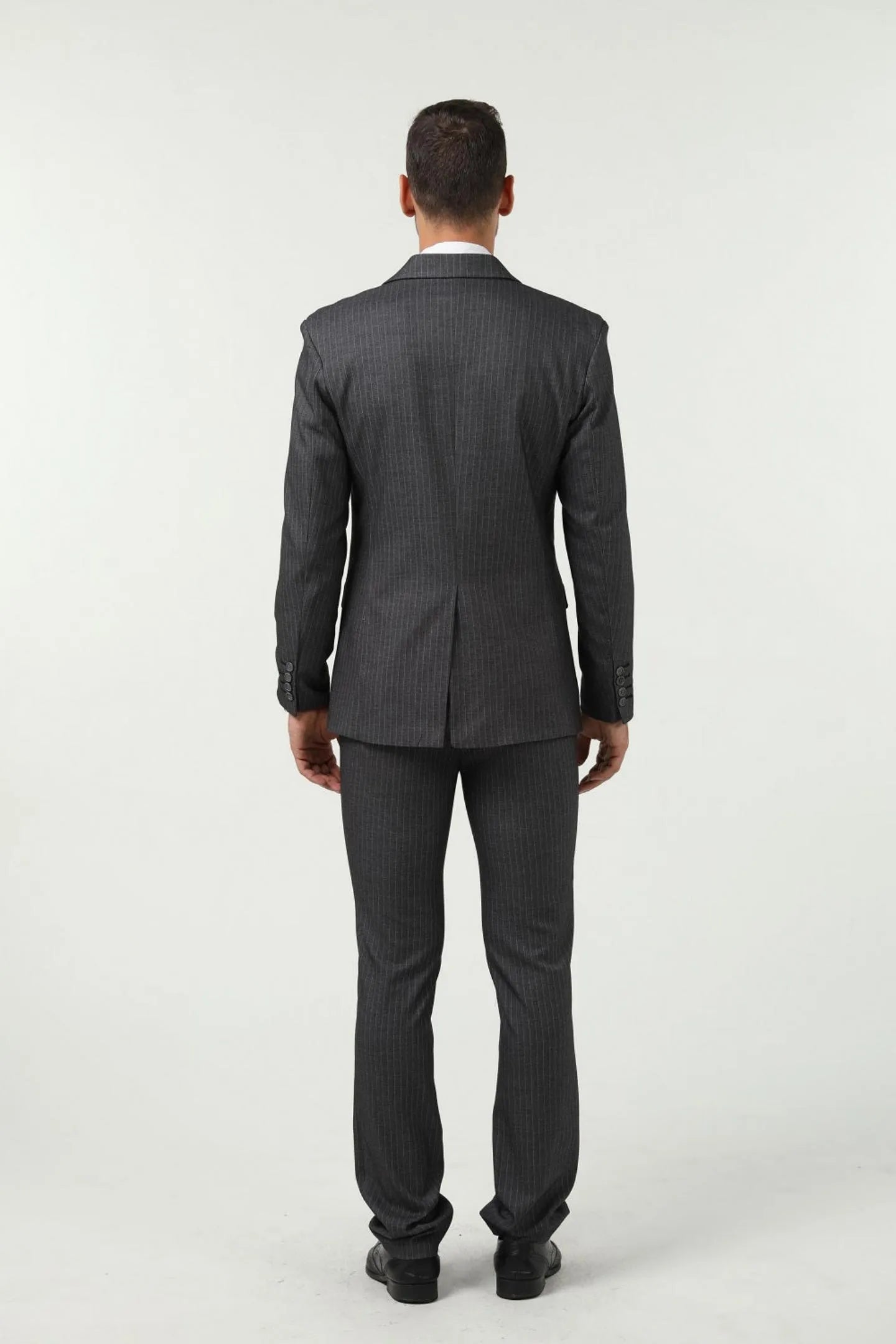 back view of gray slim fit pinstripe 3 piece men's suit – tailored fit with sleek design, perfect for formal and work settings.