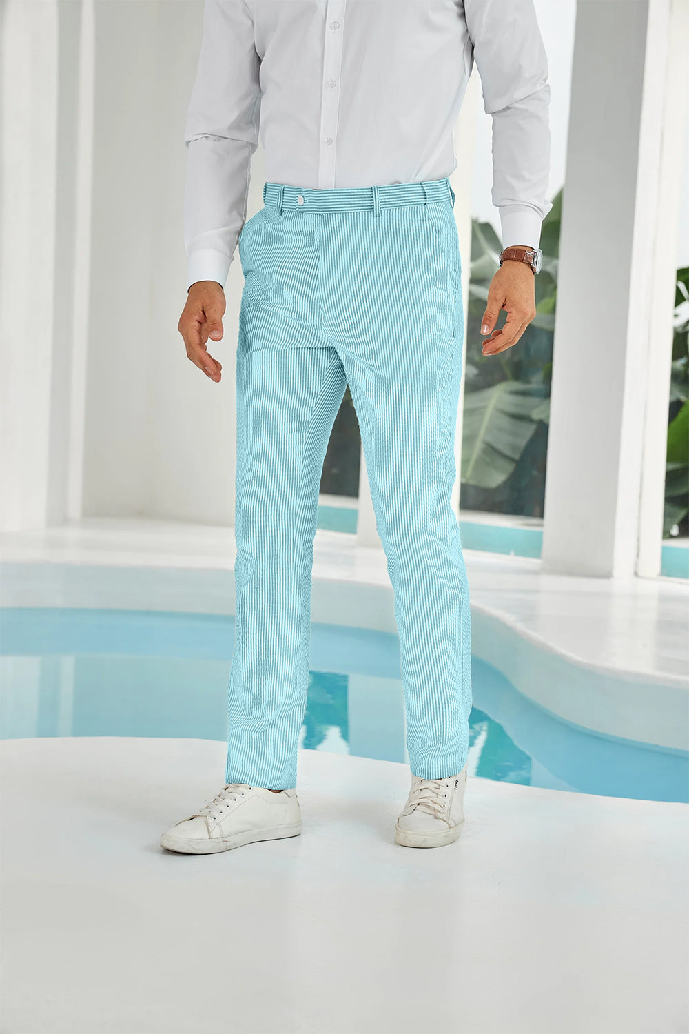 Front view of aqua seersucker pants with subtle stripes and white shirt