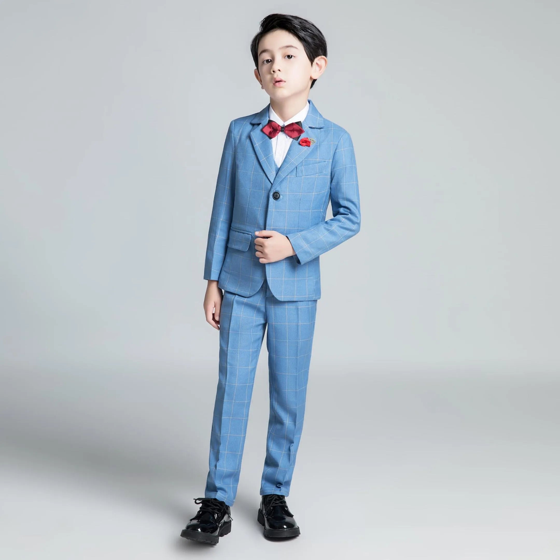 Elegant light blue checked boys 5-piece suit with notch lapel and dress shoes