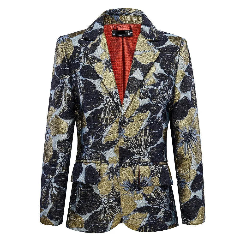 Close-up of boys suit shoulder area showing vivid red flower embroidery