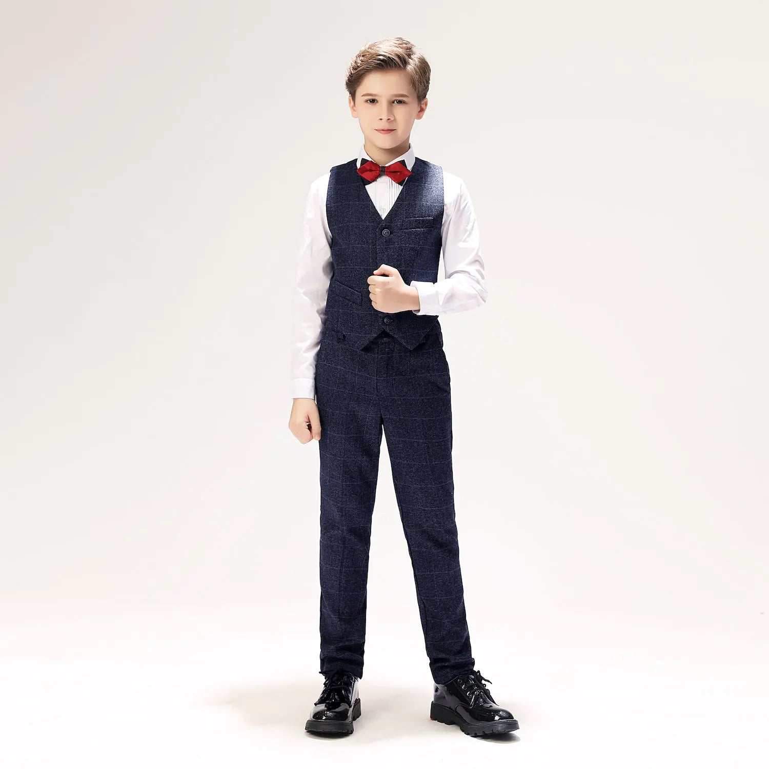 Plaid boys' prom vest outfit with red bow tie, formal wool suit look without jacket for stylish events