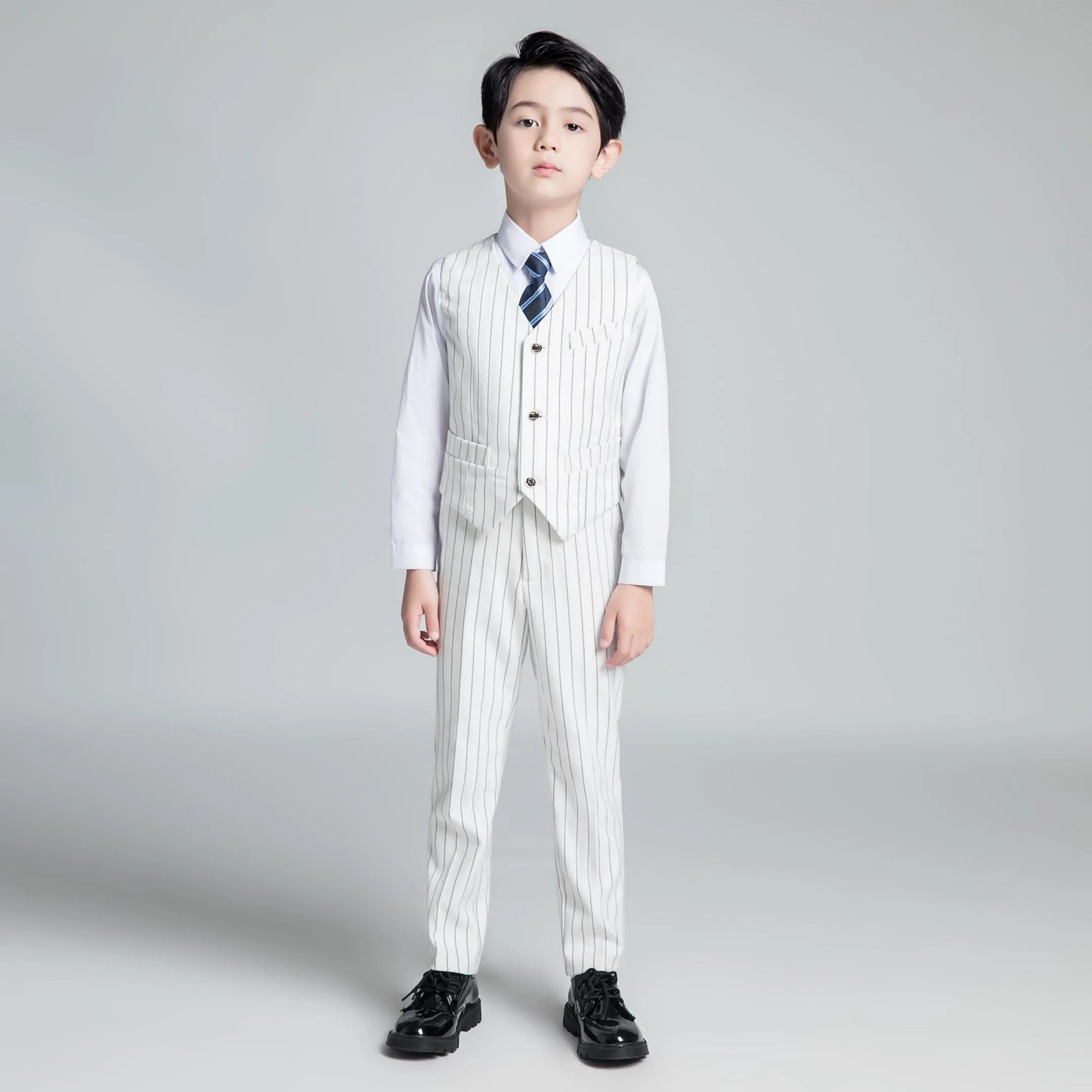 Boys white striped vest and pants with long sleeve shirt and tie