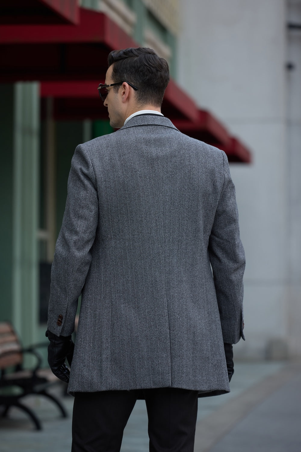 Men's gray wool overcoat - back view of urban long winter double breasted coat for men, outdoor city scene outerwear