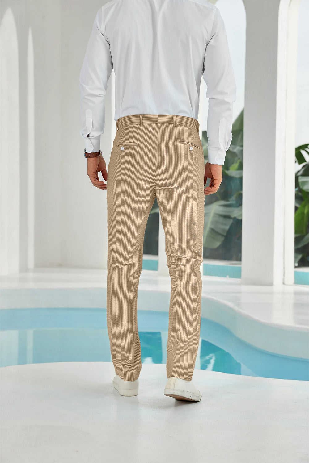 Back view showing rear pockets on khaki striped seersucker pants