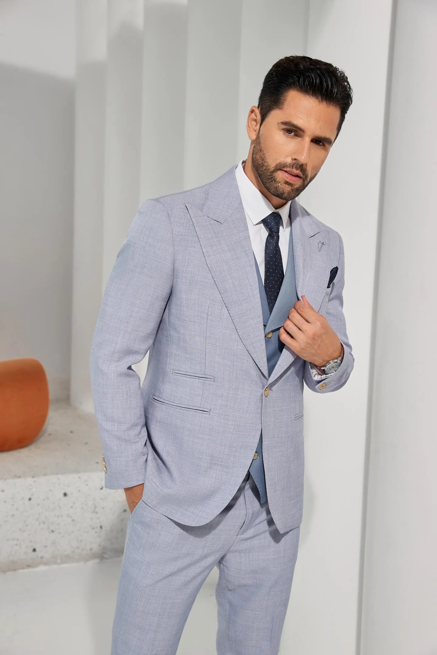 back view of men's light blue summer 2-piece suit, showcasing a stylish, comfortable fit for casual occasions.