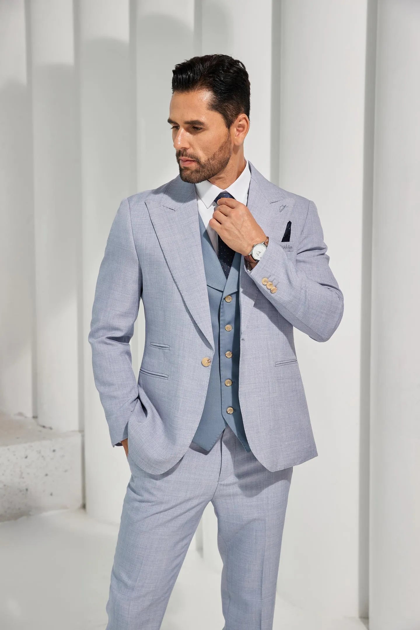men's light blue summer 2-piece suit with a relaxed fit, ideal for outdoor gatherings and casual business events.