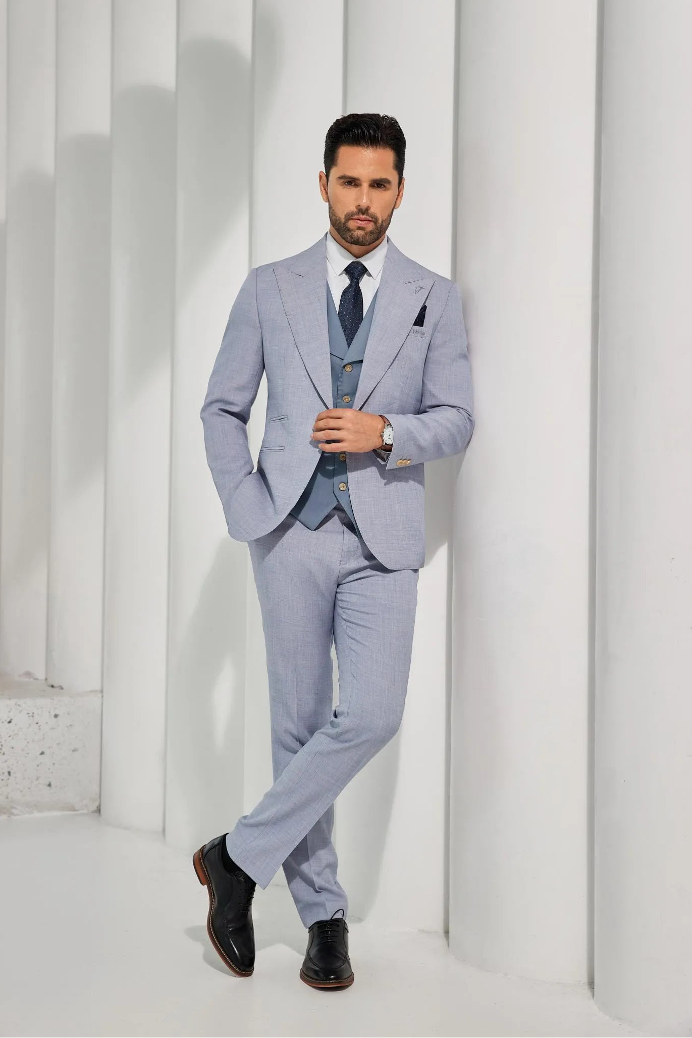 full view of men's light blue summer 2-piece suit, including blazer and pants, perfect for casual events and warm weather.