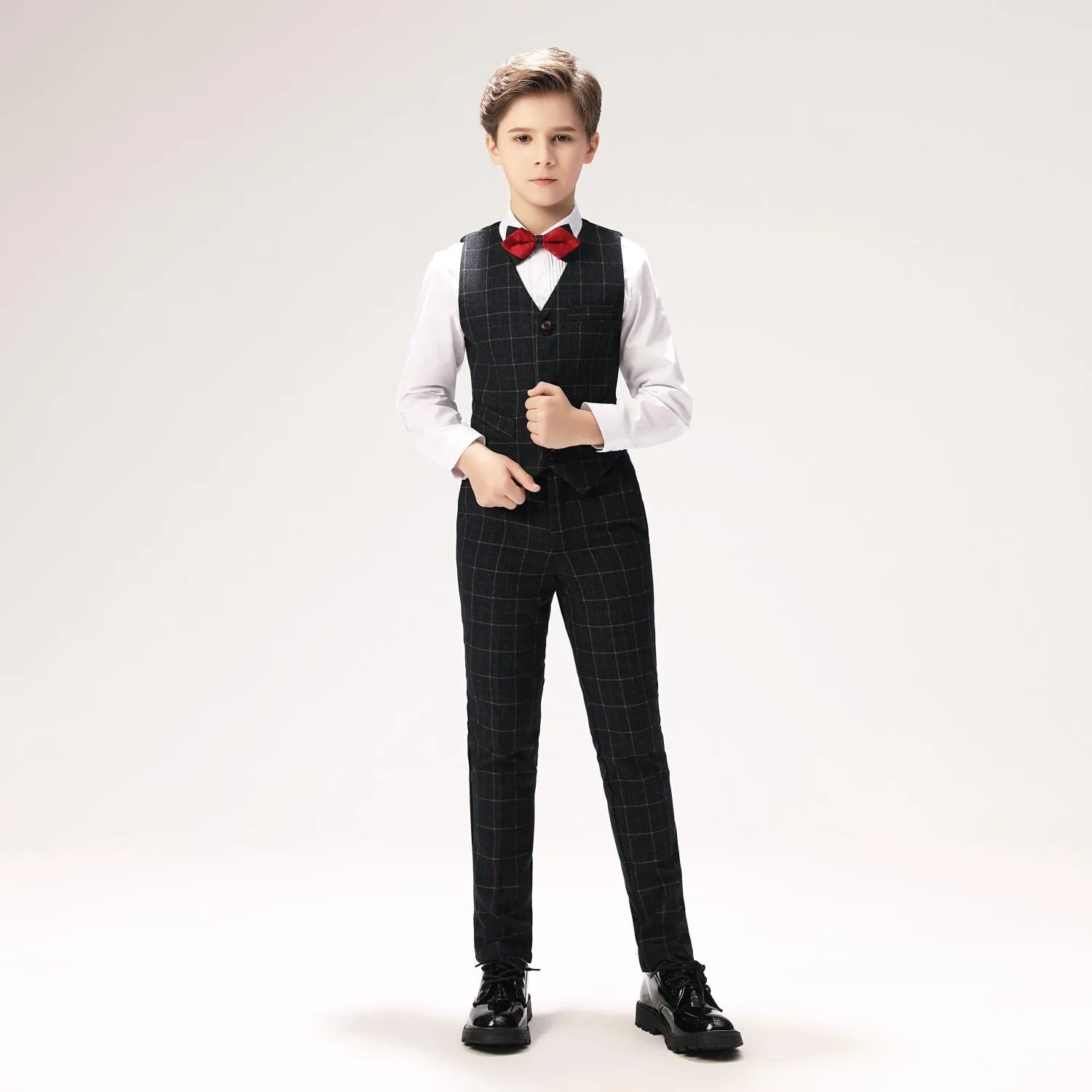 Kids black plaid vest and pants set with white shirt and bow tie, elegant wedding attire