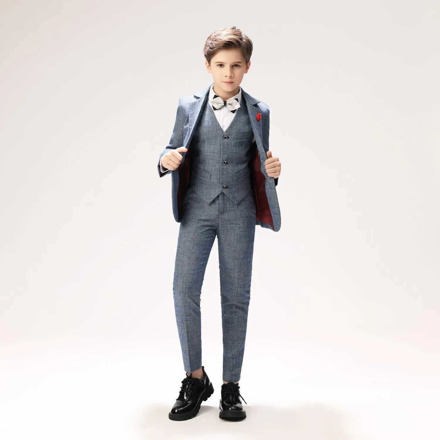 Gray boys' suit with open blazer - prom outfit, bow tie, red lapel pin & vest detail