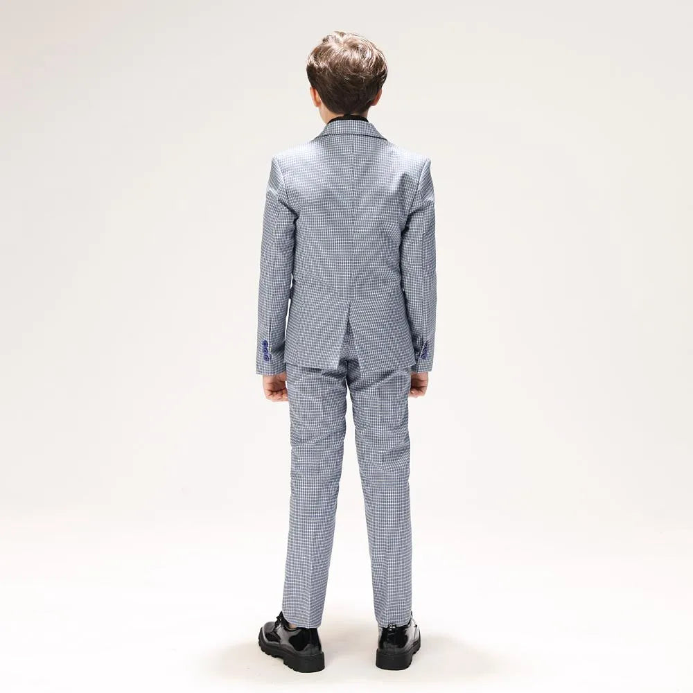 Back view of boys' plaid blazer and pants in elegant formal suit set