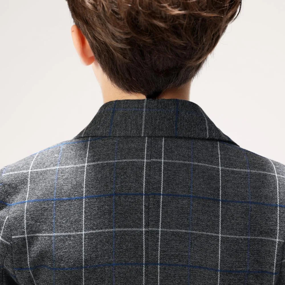 Back view of checkered collar and pattern on boys elegant 5-piece plaid suit