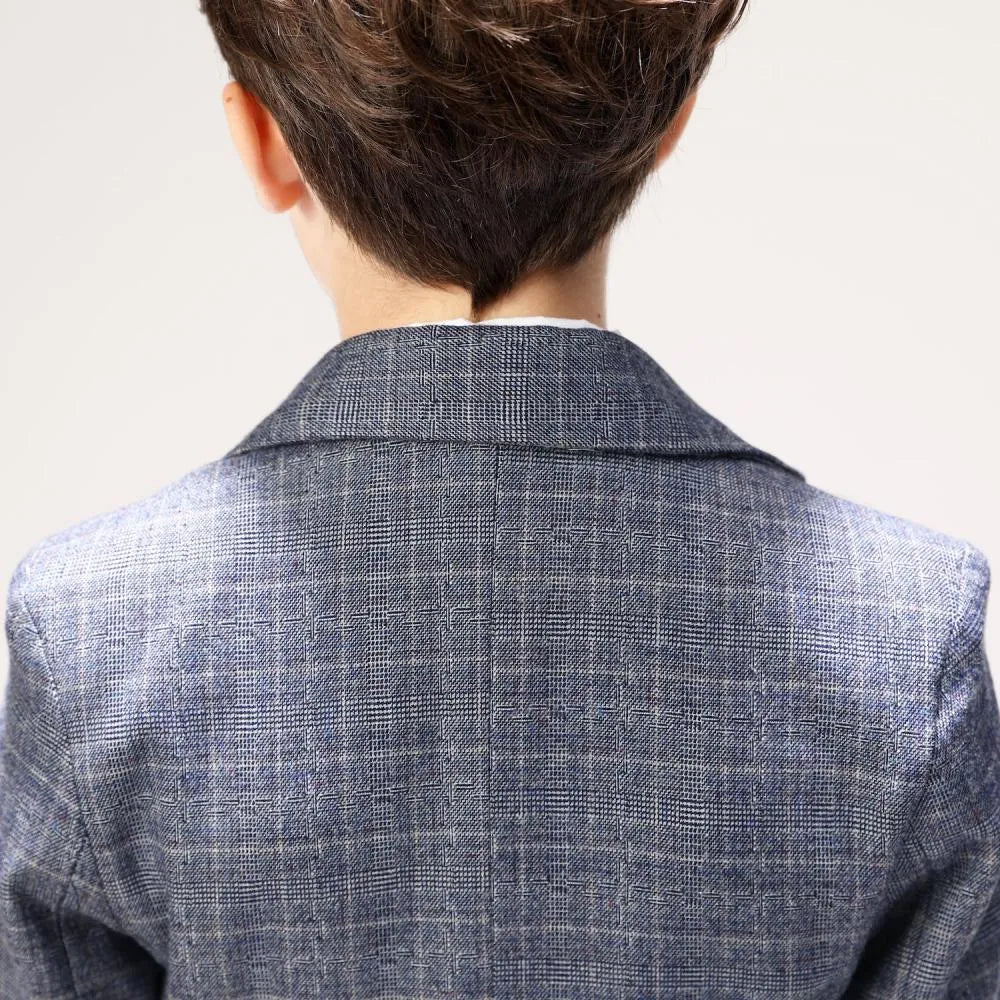 Rear view showing collar and pattern detail of boys grey plaid blazer for formal event outfit