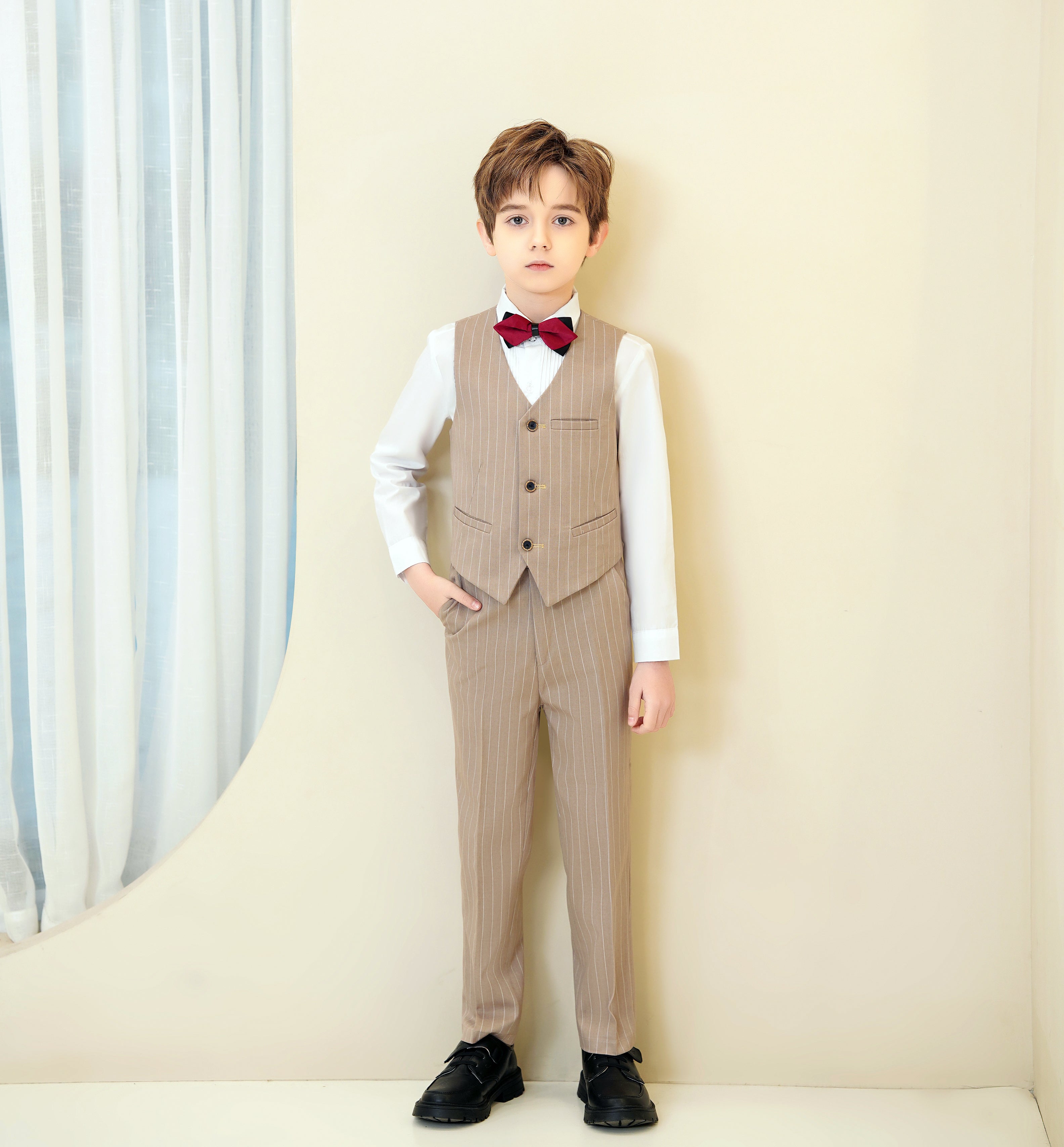 Front view of slim fit khaki striped boys suit with pockets – elegant event style
