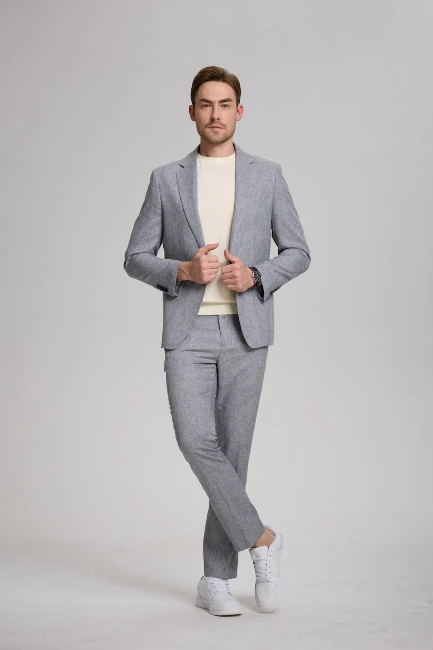 front view of men's grey lightweight casual slim fit 2-piece suit featuring a notch lapel blazer and matching trousers, perfect for smart-casual events.