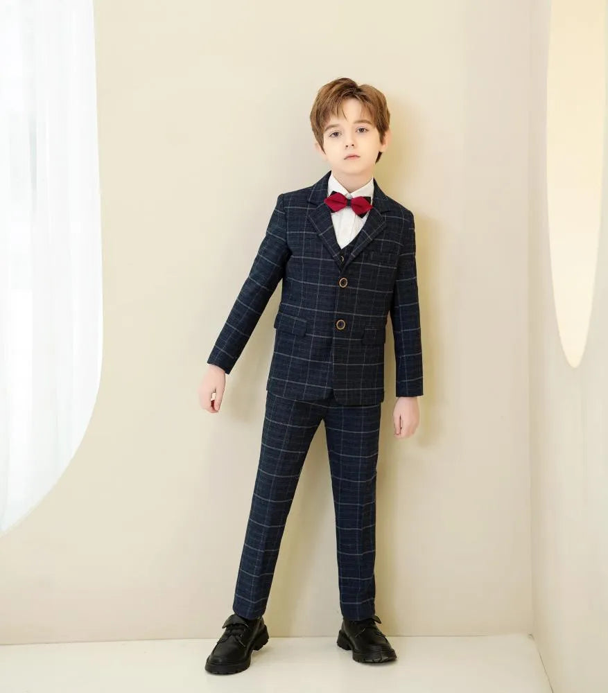 Modern formal navy plaid boys suit: Slim fit 5-piece with red bow tie accent