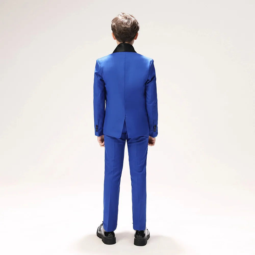 Royal blue toddler tuxedo with black trimmed pockets and red bow tie