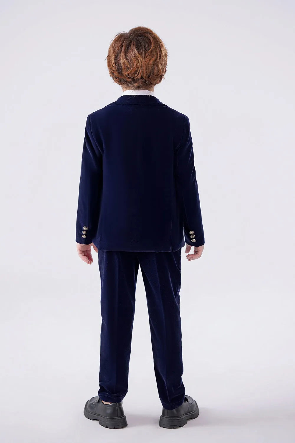 Side view of navy velvet blazer and trousers – toddler boys' holiday tuxedo outfit