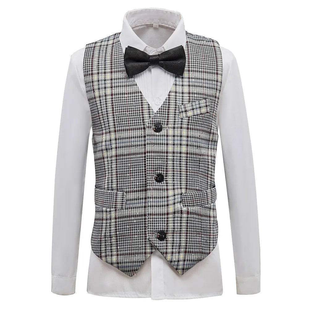 Elegant boys plaid vest and white shirt with black bow tie, formal wear style